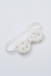 Avauma Petite Garden Baby Headband in Rose Garden with pink rosebud print on white textured cotton and soft elastic band